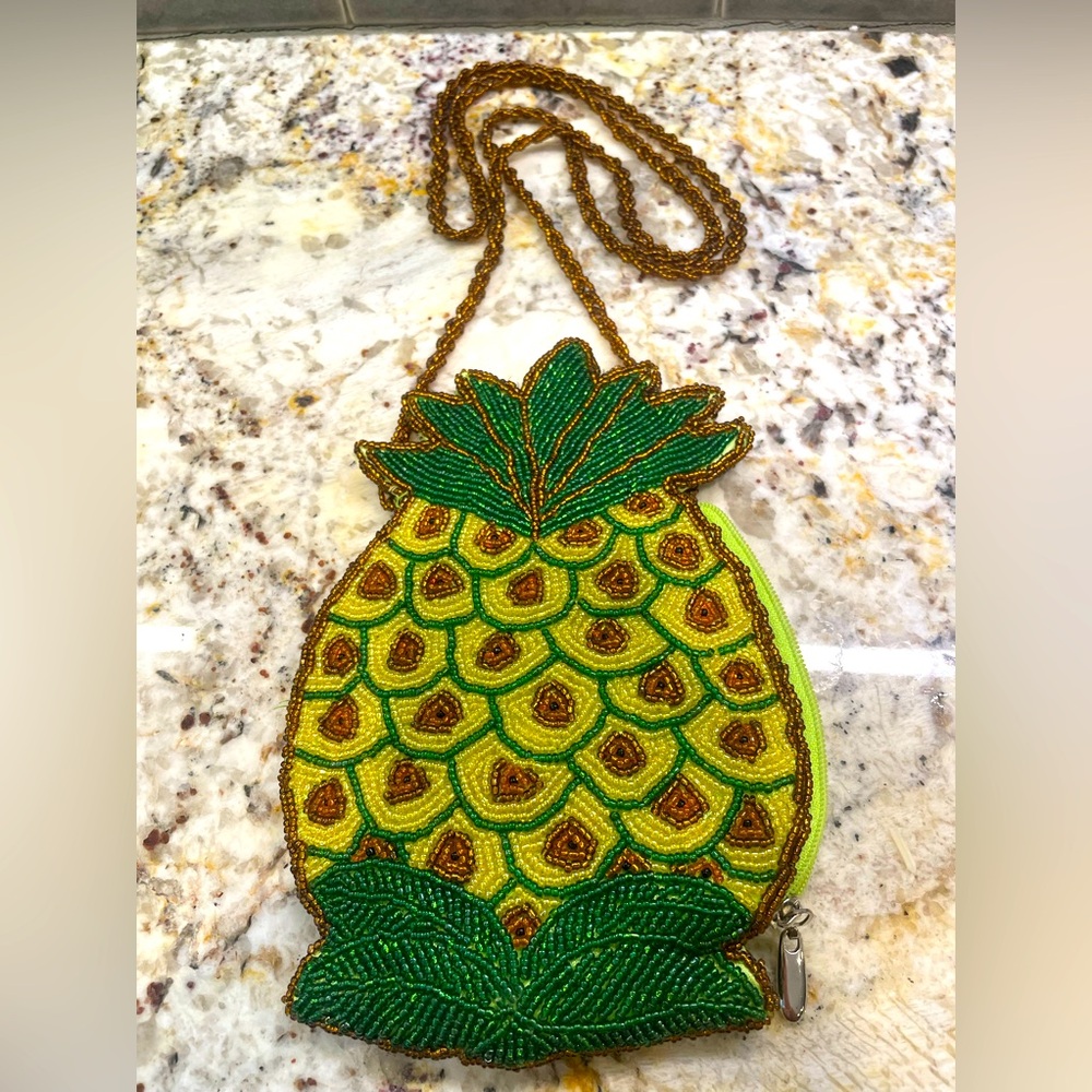 Beaded cross-body pineapple purse.